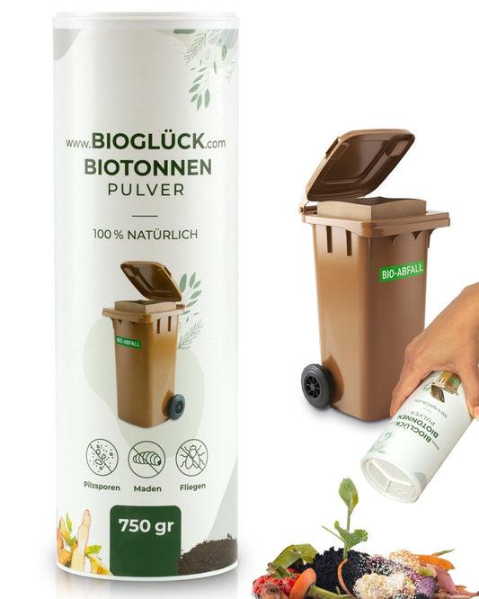 BIOGLÜCK Biotonnenpulver 750 g neben einer braunen Biotonne; eine Hand streut das mineralische Pulver über Bioabfall